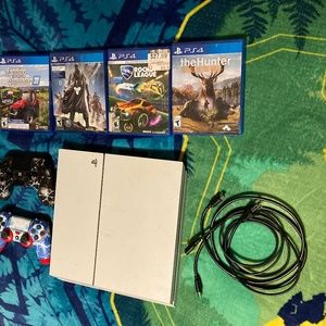 Ps4 with 2 controller's and 4 games